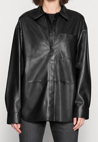 Calvin Klein Jeans Giacca in similpelle - black