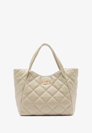 Beež voodriline kott sileda nahaga, ümar ülemus, kaks käepidet ja kuldse tooni logo aktsent ees.