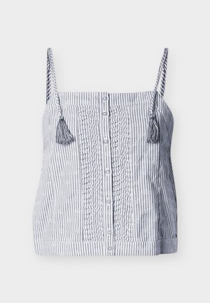 Top senza maniche a righe verticali blu e bianche con bottoni frontali, pannello centrale arricciato e nappine sulle sottili spalline.