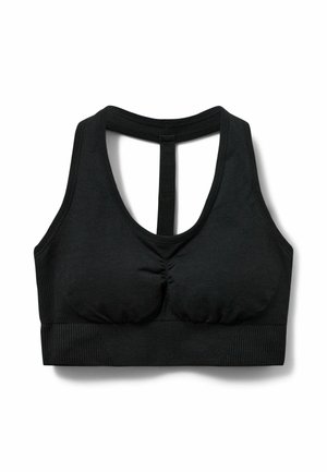 Sujetador deportivo negro sin costuras con tirantes anchos, fruncido en la parte delantera y diseño en T en la espalda para soporte y comodidad durante actividades físicas.