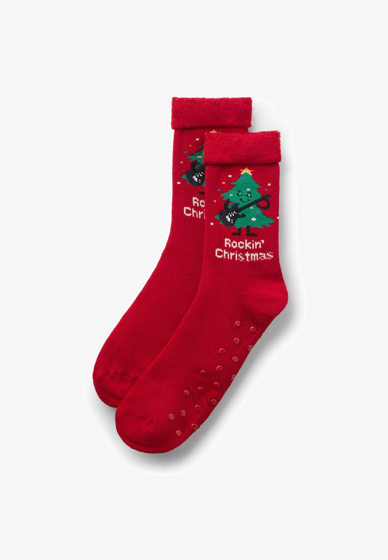 Calzini rossi con polsino morbido e soffice. Presentano un disegno a cartone animato di un albero di Natale e il testo "Rockin' Christmas". Motivo antiscivolo a puntini sulla suola.