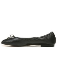 Black leather ballet flat with a rounded toe, featuring a small bow accent and a slim, flat rubber sole. Smooth texture and minimal design.