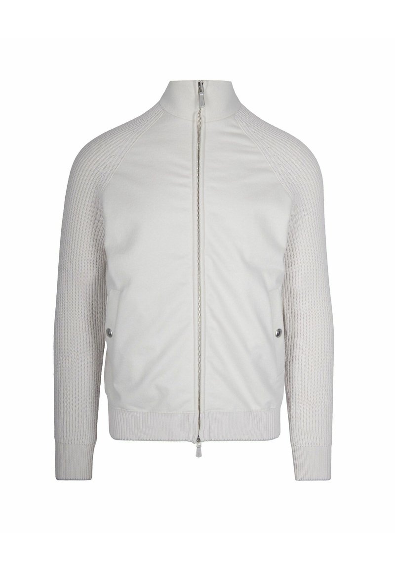 Giacca bianca con zip, maniche e colletto a maglia a coste, tasche laterali con bottone e colletto alto.