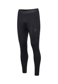 Leggings de sport noirs slim fit avec taille élastique, détail en mesh près de la hanche et logo hummel discret sur la cuisse.