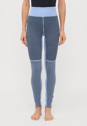 Blå leggings med høy midje, med vertikale og hundetannmønstre. Laget av et teksturert stoff, med kontrasterende lyseblå detaljer.