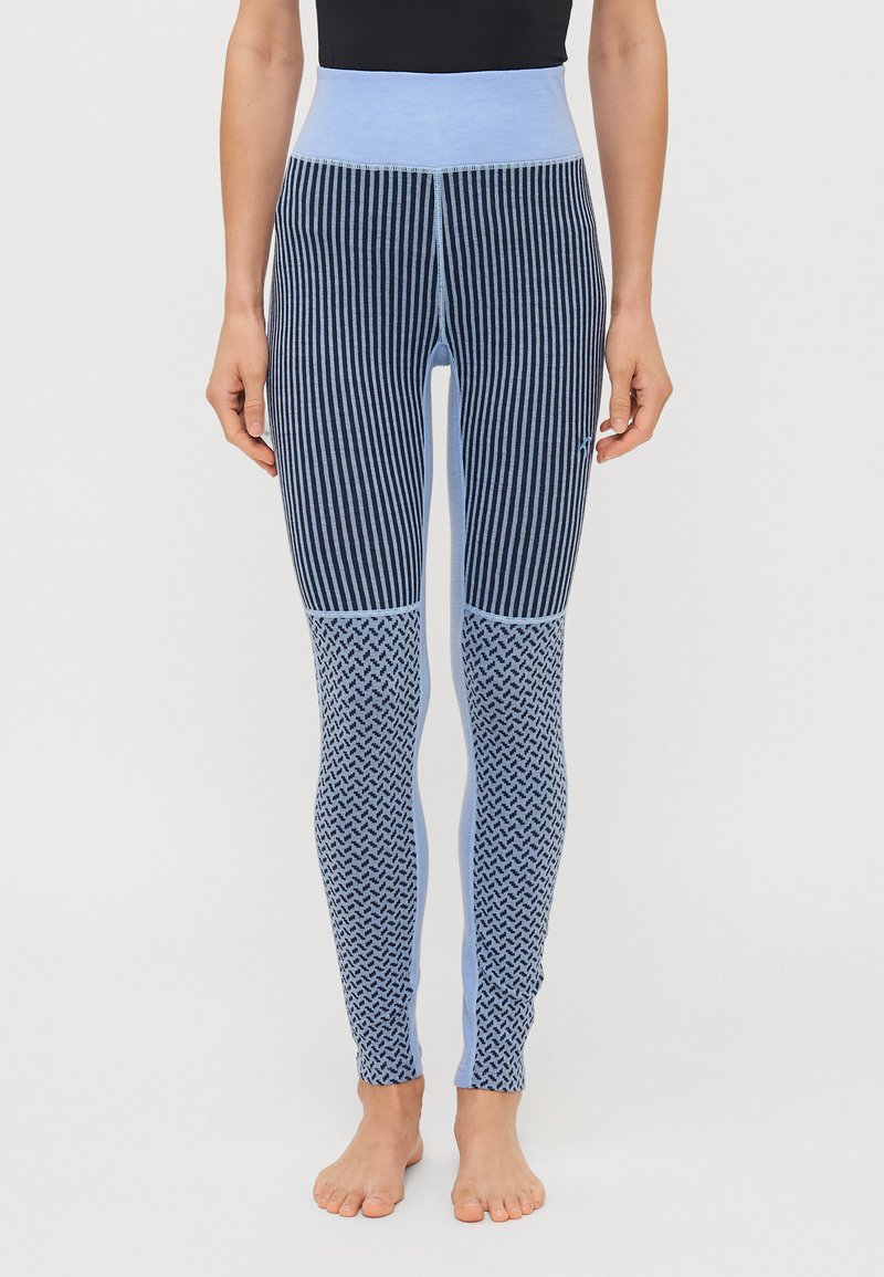 Blå leggings med hög midja, med vertikala och hundtandmönster. Tillverkade av ett texturerat tyg, med kontrasterande ljusblå detaljer.