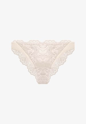 Lace thong in light beige featuring floral pattern and scalloped edges. Soft texture with elastic waistband for comfortable fit.