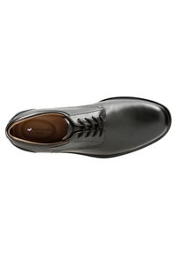 Schwarze Leder-Dressschuhe mit Schnürdesign, runder Zehenform, kontrastierenden Nähten und glatter Oberfläche. Das Innere verfügt über eine gepolsterte Innensohle.