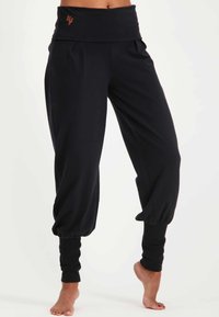 Urban Goddess DEVI YOGA - Tygbyxor - urban black