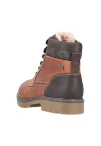 Bottine en cuir brun avec des accents brun foncé, surface texturée, conception à lacets et doublure en fourrure au col. Semelle en caoutchouc robuste.