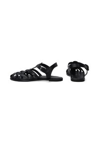 Zwarte sandalen van synthetisch materiaal, met een bandenontwerp, platte zool en een verstelbare gesp aan de zijkant.
