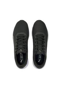 Schwarze Mesh-Sportschuhe mit einer strukturierten Oberseite und flachen Schnürsenkeln. Mit einer weißen Sohle und Markeninnensohlen.