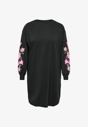 Čierne oversize šaty s dlhými rukávmi, zdobené ružovou kvetinovou výšivkou na oboch rukávoch. Mäkká látka a voľný strih.