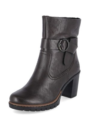 Stivaletto in pelle marrone scuro con tacco robusto, cinturino con fibbia rotonda, dettagli di cuciture e suola in gomma scanalata.