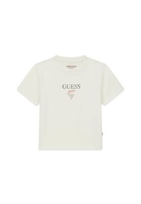 Wit katoenen T-shirt met korte mouwen, ronde halslijn en het "GUESS jeans" logo in grijs en roze, gecentreerd aan de voorkant. Gladde textuur.