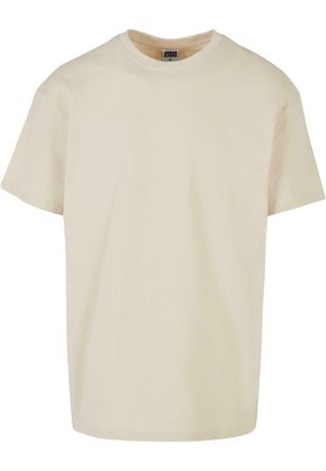 Kortærmet, rundhalset t-shirt i lys beige bomuld. Klassisk pasform med lige kant og uden grafiske design eller accenter.
