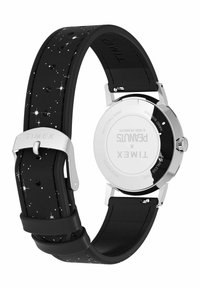 Timex óra fekete bőrszíjjal, ezüst csillagmintákkal, rozsdamentes acél tok és fényes ezüst csattal.