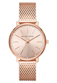 Montre à bracelet en mailles rose gold avec un cadran texturé en rose gold, présentant des index horaires et quatre accents en diamants. Nom de la marque affiché.