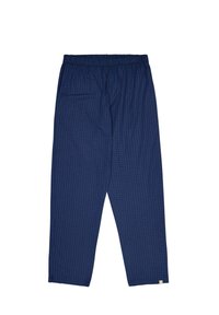 Marineblauwe broek met een rasterpatroon, gemaakt van lichtgewicht stof. Voorzien van een elastische tailleband en een losse pasvorm.