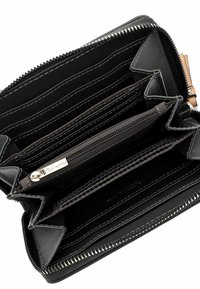 Black zip-around wallet with multiple card slots, a central zippered compartment, and contrasting white stitching details. Smooth exterior finish.
