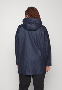 ONLY Carmakoma Regnjacka - dark blue