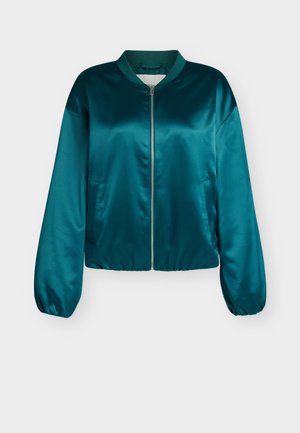 Teal satiinist bomber jope, millel on tõmblukk ees, elastsed varrukad ja äär. Omab kahte küljetaskut ja ümarat kraed. Sile tekstuur.