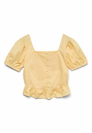 Haut court jaune pâle avec manches courtes bouffantes, encolure carrée, boutons sur le devant et ourlet à volants.