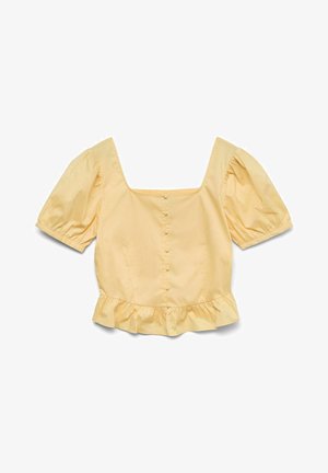 Haut court jaune pâle avec manches courtes bouffantes, encolure carrée, boutons sur le devant et ourlet à volants.