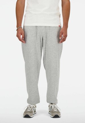 New Balance JOGGING - Pantaloni sportivi - grau
