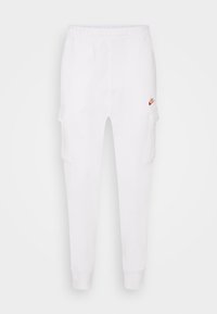 Vita Nike cargo byxor med elastisk midja, två sidofickor och en liten röd logga på vänster lår. Avsmalnande ankle cuffs.