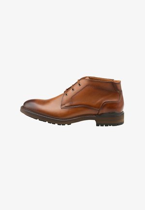 Braune Leder-Ankle-Boots mit abgerundeter Zehenform, Schnürung, subtilen Nähte und einem niedrigen Absatz mit einer strukturierten Gummisohle.