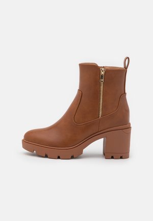 Bottines à plateau - cognac