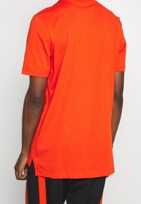 adidas Originals Triko s potiskem - black