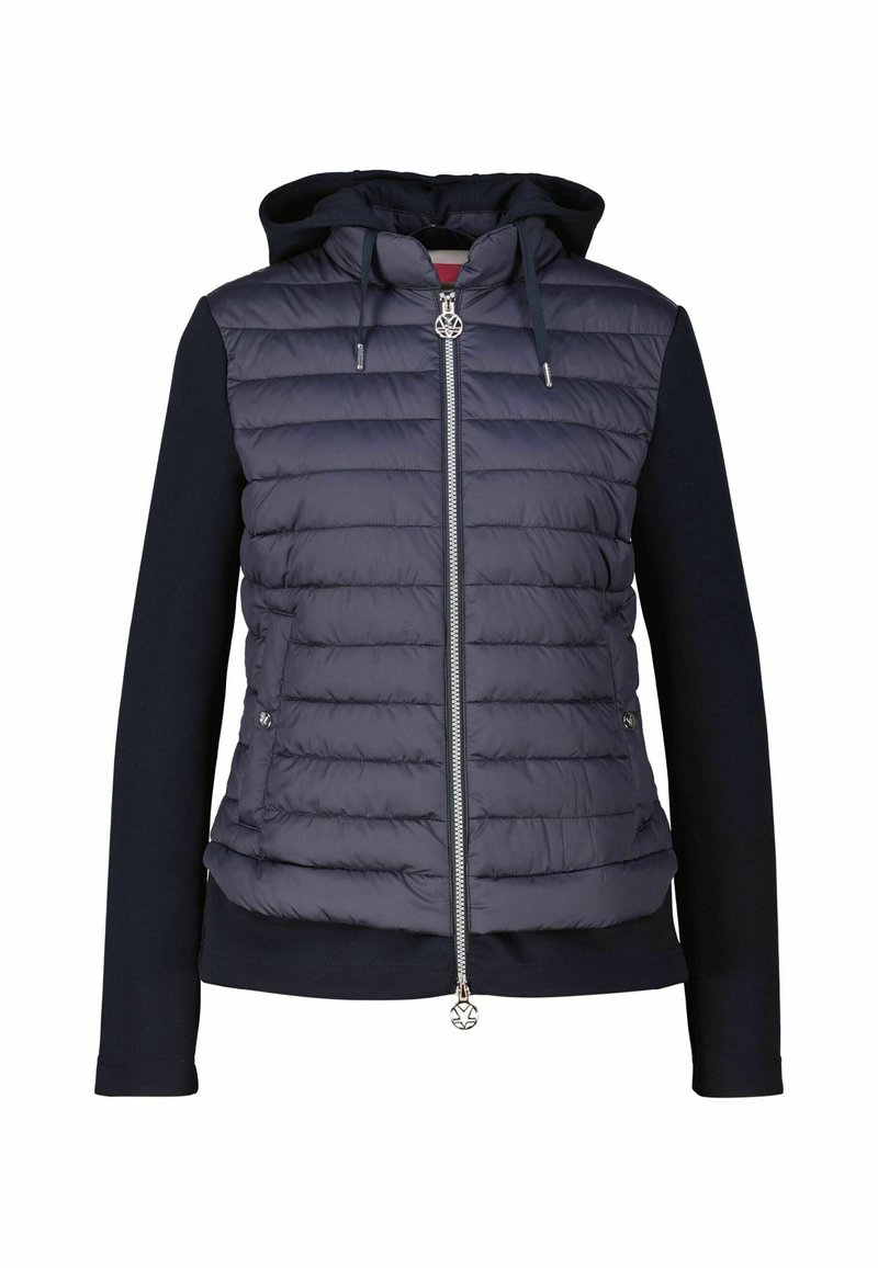 Navy puffer jacket with a hood, featuring a zippered front, quilted texture on the upper, and solid fabric on the arms and lower section.