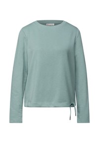 Haut à manches longues vert menthe clair avec un col rond, en tissu doux, et un détail de cordon à l'ourlet. Coupe décontractée et confortable.