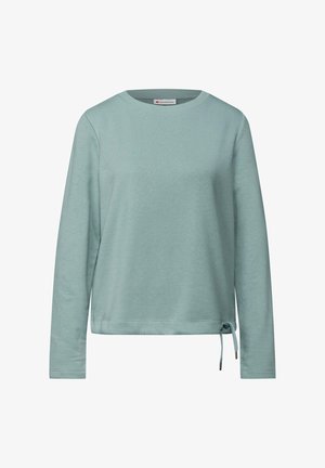 Lys mintgrøn langærmet top med rund hals, blødt stof og snøring detalje i kanten. Casual afslappet pasform.