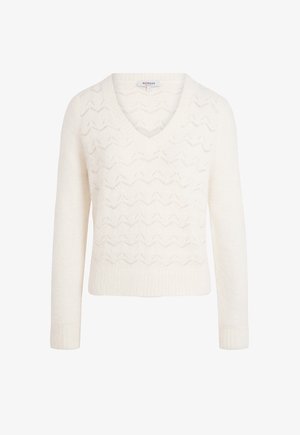 Suéter de color crema con escote en V, de mangas largas y un sutil patrón de tejido en zigzag en la parte delantera y el torso.