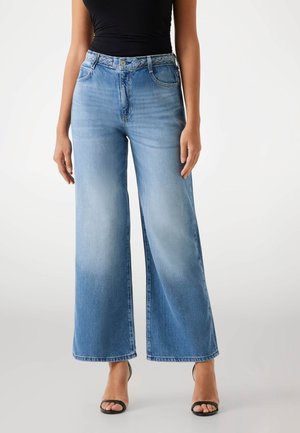UND GEFLOCHTENER BUND - Wide leg - hellblau