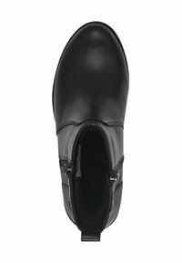 Bota de tobillo de cuero negro con punta redondeada, cremalleras laterales y un forro interior suave para mayor comodidad.