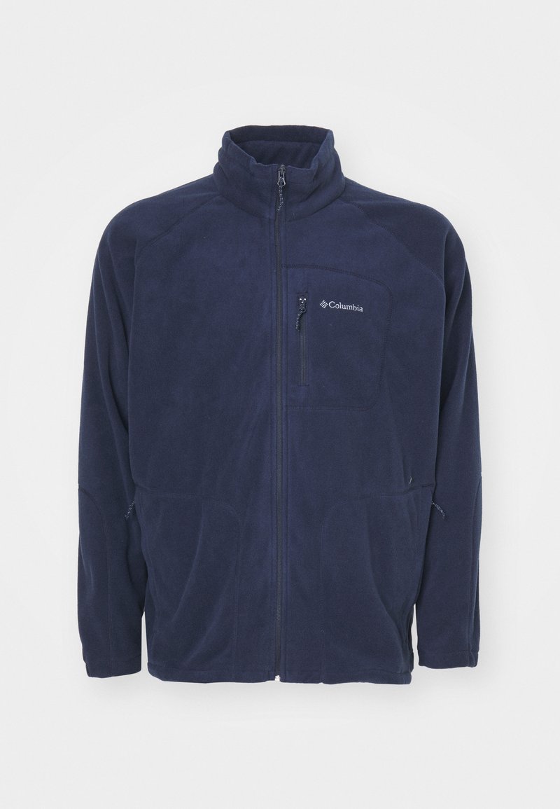 Navy fleece jacket with a high collar, full zip, and zippered chest and side pockets. Features a smooth texture and logo detail.