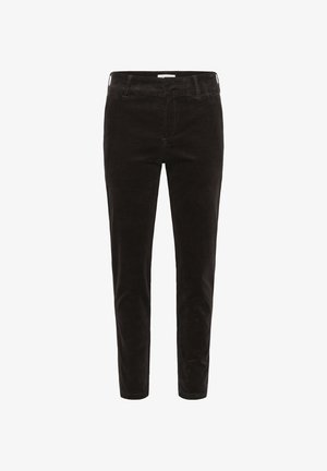 Mustrashallased musta corduroy'ga, mis on kitsas lõikega ja keskmise kõrgusega, esi-taskud ja sile tekstuur. Lihtne disain, nähtavat riistvara pole.