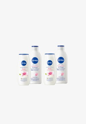 NIVEA body lotion bottles, white with blue caps, depict rose graphics. Three variations include "Rose & Almond Oil" and “Rosenblüte & Pflege” labels.