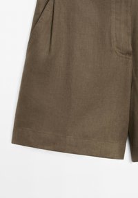Brown fabric shorts with side pockets and visible stitching detail on a white background.