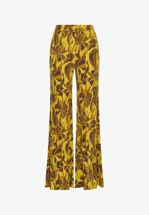 Yellow wide-leg pants with a brown and orange abstract floral pattern, high waist, and smooth fabric texture.
