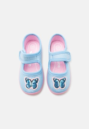Blue and pink toddler shoes with Velcro straps and sequined butterfly patches on the toes, shown from above on a white background.