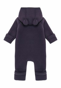 Fialový fleecový overal s kapucňou, so zelenými guľôčkami. Dlhé rukávy s prehnutými manžetami a jednoduchý, elegantný tvar.