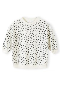 Cremefarvet pullover sweater med sorte prikker, ribbet rund hals og sammensnørede ærmer. Blødt stof med en afslappet pasform.