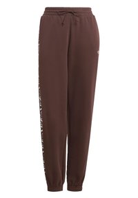 Brown sweatpants with elastic waist and cuffs, drawstring, and patterned side stripes featuring a white Adidas Trefoil logo on the thigh.