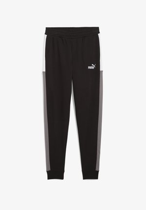 Pantalons de sport noirs avec des panneaux latéraux gris, taille élastique et logo PUMA blanc. Design de jambes fuselées, texture de tissu douce.