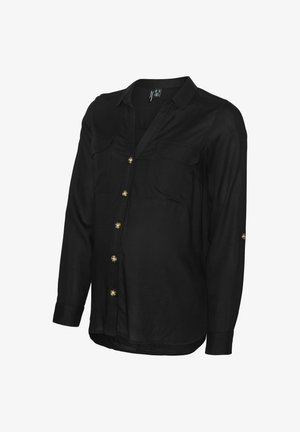 Mustansinised pikkade varrukatega nööpidega särk, mis on valmistatud siledast kangast, millel on kaks rinnataskut ja kuldsed nööbid, kõver varrukas ja üles keeratavad varrukad.